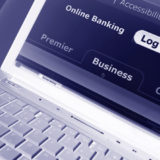 Online Banking auf dem Bildschirm eines Laptops