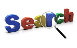 "Search" in bunten Buchstaben mit Lupe