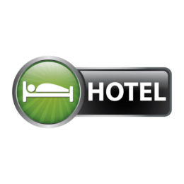 Symbol mit einem weißen Bett auf grünem Hintergrund neben dem Schriftzug "Hotel"