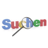 Lupe vor dem Wort "Suchen" in Google-Farben