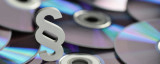 CDs mit Paragraphen-Symbol