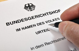 Ueberschrift eines BGH-Urteils mit einer Hand, die einen Kugelschreiber hält.