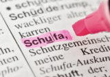 Schufa mit pinker Makierung