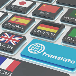 Verschiedene Sprachen auf einer Tastatur und eine "translate"-Taste.