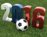 Schriftzug 2016 in den französischen Nationalfarben auf grünem Fußballrasen, davor ein Fußball, EM 2016
