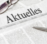 Zeitung mit der Überschrift Aktuelles