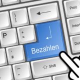 Tastatur mit dem Aufdruck "Bezahlen"