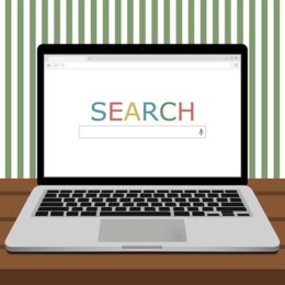 Laptop mit Suchmaschine in Google-Optik
