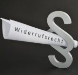 Paragraphenzeichen mit einem gerollten Blatt, auf dem "Widerrufsrecht" geschrieben ist