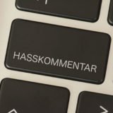 Hasskommentar Taste auf Tastatur
