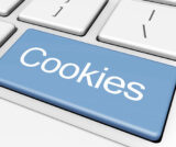 Cookies Schriftzug auf blaue Taste